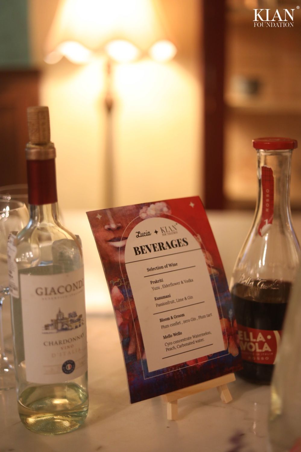 Beverage menu card between bottles